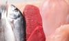 poisson à côté d'une tranche de viande rouge et d'un filet de poulet crus